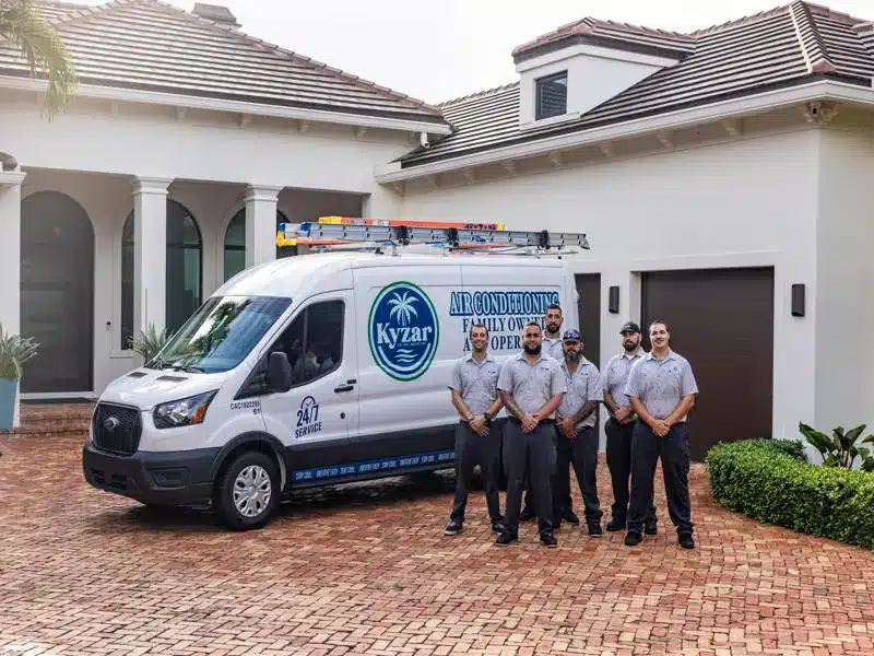 Kyzar team in front of truck